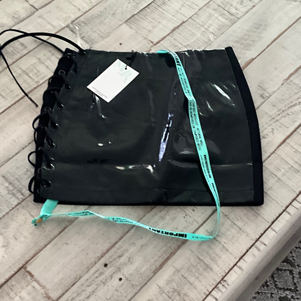 Trendy Black Mini Skirt with Lace-Up Detail